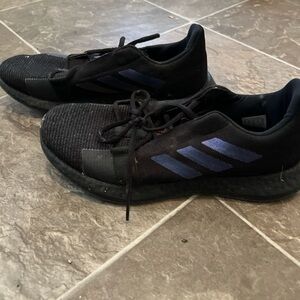 Adidas Black Sneakers with Blue Stripes